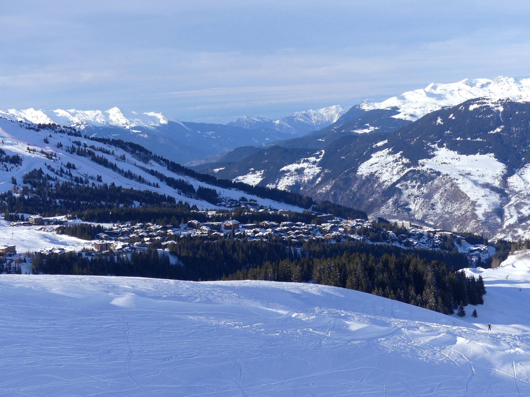 Courchevel and the snowy valley seen from the east in winter